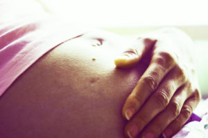 belly of a pregnant woman